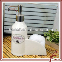 stoneware soap dispenser with white sponge holder